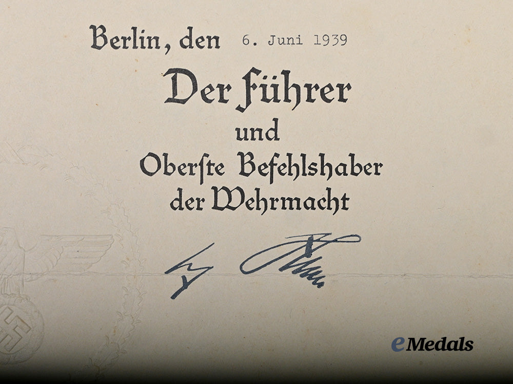 germany,_kriegsmarine._an_award_document_for_a_spain_cross_in_bronze_with_swords,_to_matrosenobergefreiter_johann_breu_e_medals__g62734_3