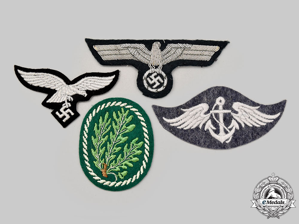 germany,_wehrmacht._a_mixed_lot_of_uniform_insignia__g515881
