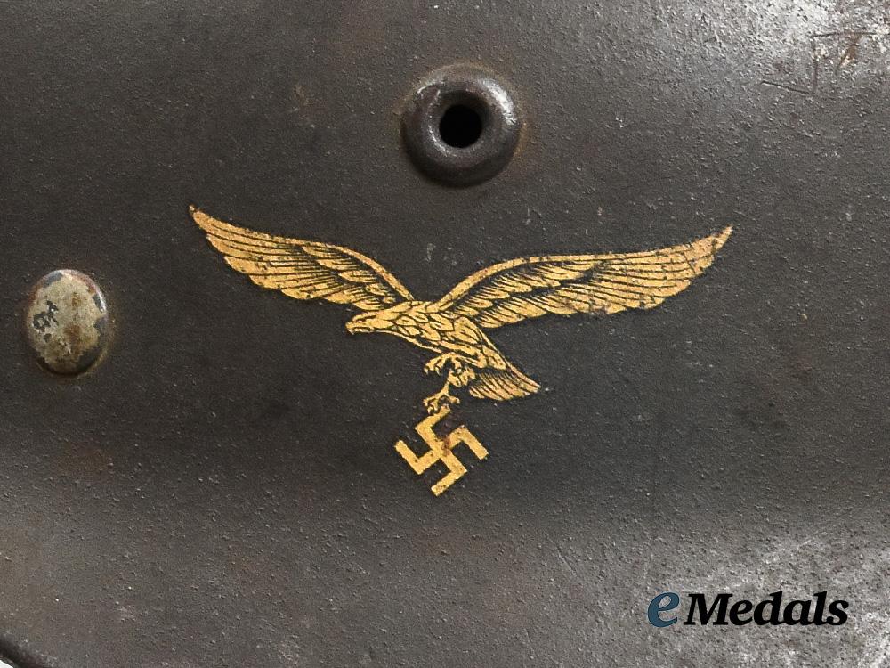 germany,_luftwaffe._an_m40_stahlhelm,_by_quist__g54836-11