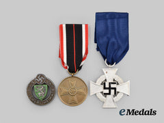 Germany, Third Reich. A Mixed Lot of Three Medals, Awards, and Badges