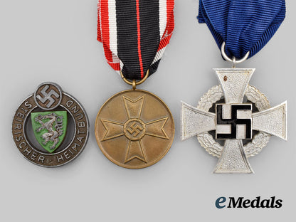 germany,_third_reich._a_mixed_lot_of_three_medals,_awards,_and_badges__g56885-2