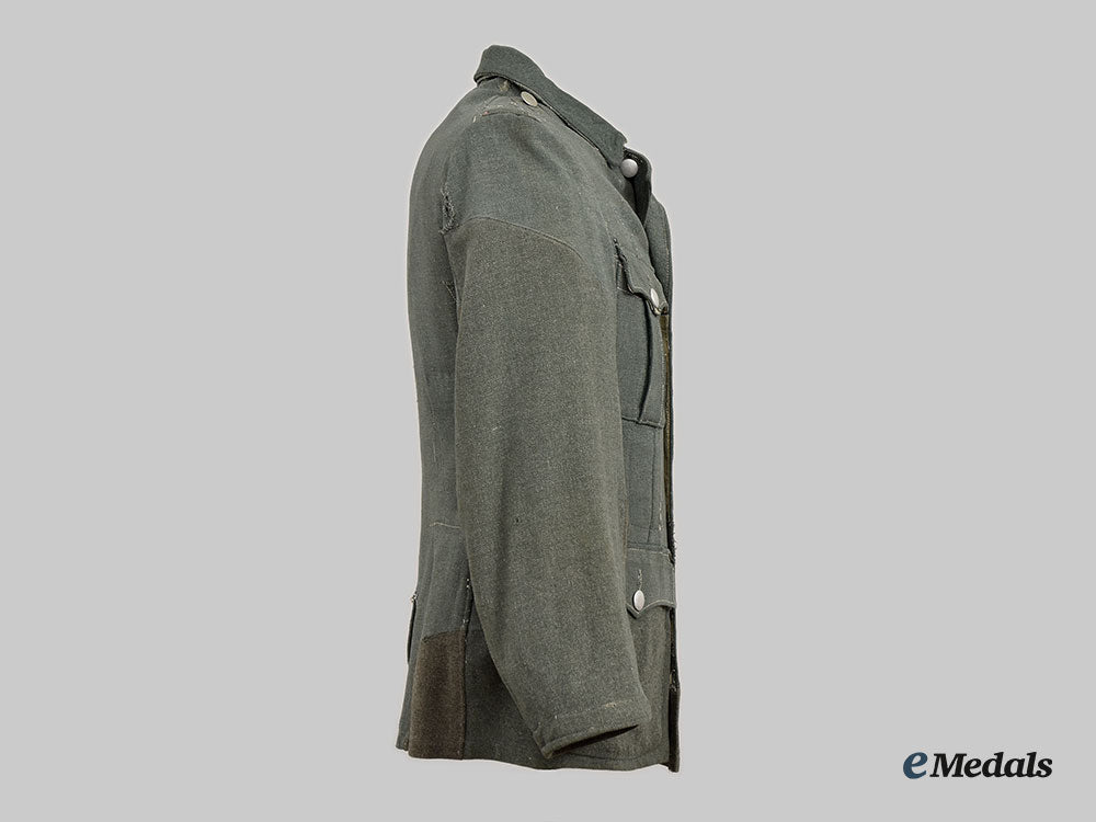 germany,_wehrmacht._a_late_war_de-_badged_uniform_tunic__l22__m_n_c0974_738