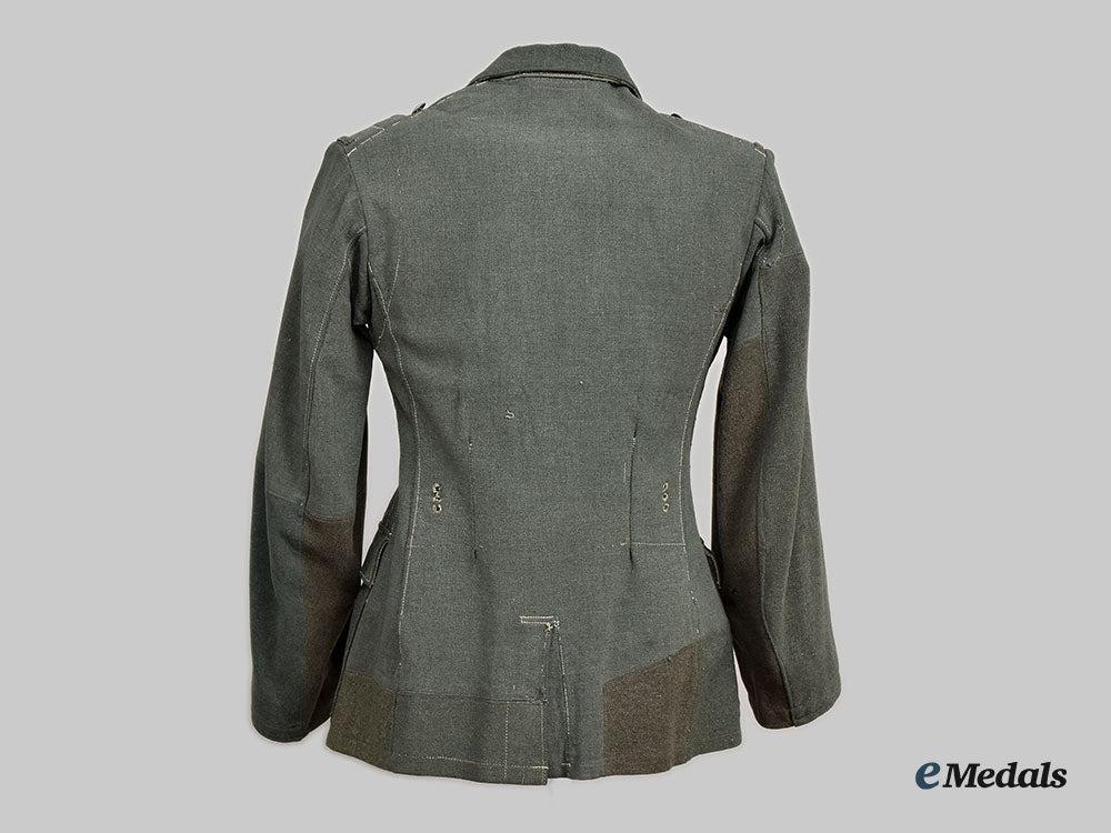 germany,_wehrmacht._a_late_war_de-_badged_uniform_tunic__l22__m_n_c0977_741