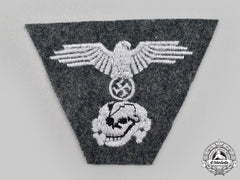 Germany, SS. A Mint and Unissued Late War Waffen-SS M43 Field-Cap Trapezoid Insignia