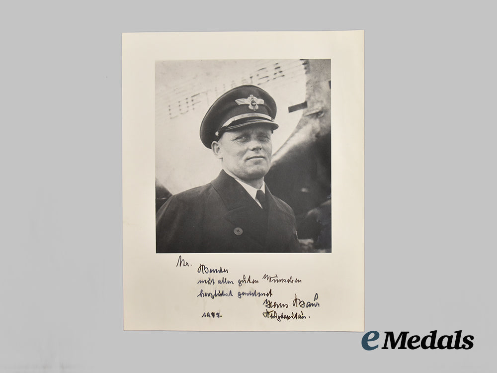 germany,_third_reich._a_pair_of_post-_war_signed_photographs_of_a_h_personal_pilot_hans_bauer,_dedicated_to_roger_j._bender___m_n_c0011
