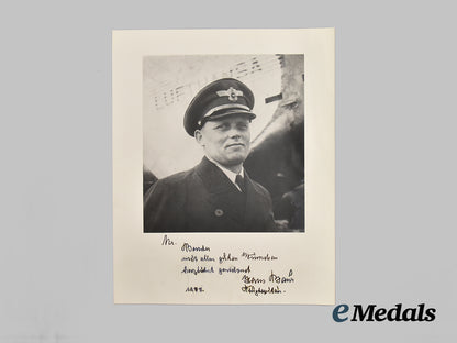 germany,_third_reich._a_pair_of_post-_war_signed_photographs_of_a_h_personal_pilot_hans_bauer,_dedicated_to_roger_j._bender___m_n_c0011