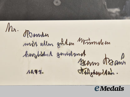 germany,_third_reich._a_pair_of_post-_war_signed_photographs_of_a_h_personal_pilot_hans_bauer,_dedicated_to_roger_j._bender___m_n_c0012