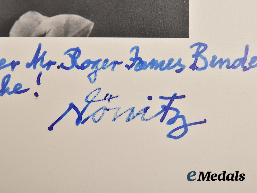 germany,_kriegsmarine._a_post-_war_signed_portrait_of_großadmiral_karl_dönitz_dedicated_to_roger_j._bender___m_n_c0066