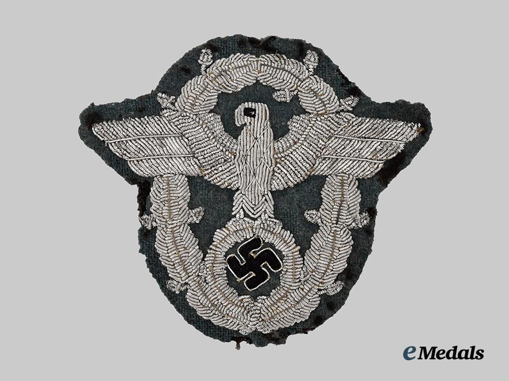 germany,_ordnungspolizei._a_schutzpolizei_officer’s_sleeve_eagle___m_n_c0126