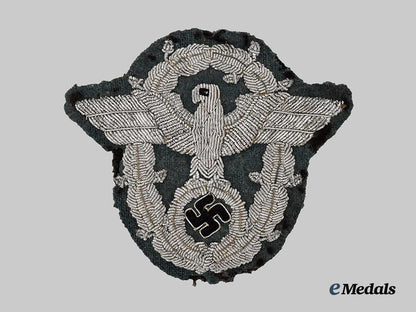 germany,_ordnungspolizei._a_schutzpolizei_officer’s_sleeve_eagle___m_n_c0126