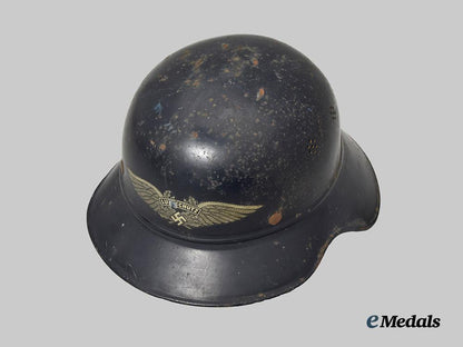 germany,_third_reich._a_luftschutz_gladiator_helmet,_owner-_attributed_one-_piece_version,_by_f._w._quist___m_n_c0139