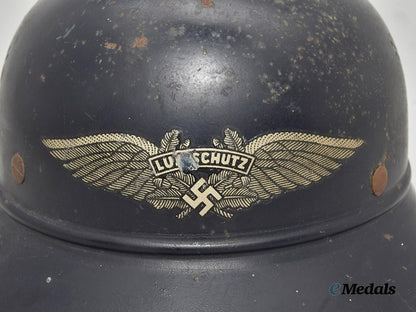 germany,_third_reich._a_luftschutz_gladiator_helmet,_owner-_attributed_one-_piece_version,_by_f._w._quist___m_n_c0140