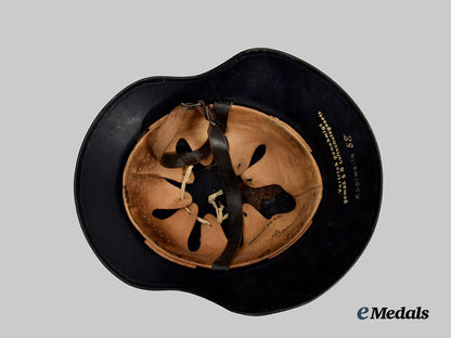 germany,_third_reich._a_luftschutz_gladiator_helmet,_owner-_attributed_one-_piece_version,_by_f._w._quist___m_n_c0142