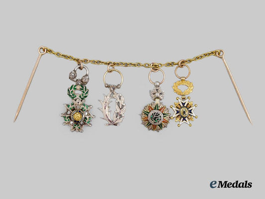 international._an_unusual_miniature_medal_chain_of_four_awards,_with_diamonds___m_n_c0153