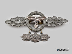Germany, Luftwaffe. A Transport and Glider Clasp, Gold Grade with Star Pendant, by Gustav Brehmer
