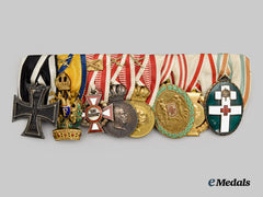 Austria, Empire. A Fine Red Cross Medal Bar with Eight Awards