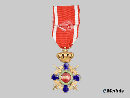 romania,_kingdom._an_order_of_the_star_of_romania,_knight’s_cross_with_swords___m_n_c0416