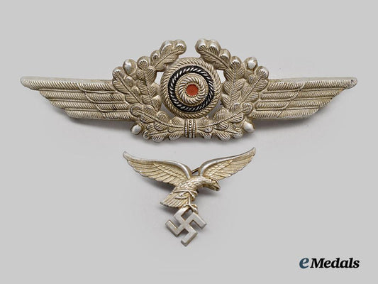 germany,_luftwaffe._a_pair_of_visor_cap_insignia_for_enlisted_ranks___m_n_c0437