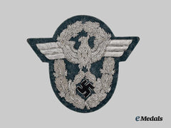 Germany, Ordnungspolizei. A Mint Schutzpolizei Officer’s Sleeve Eagle