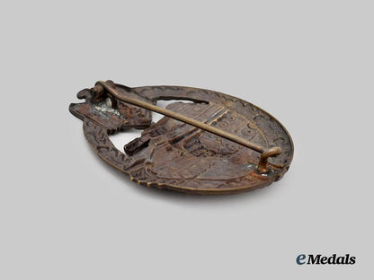 germany,_wehrmacht._a_panzer_assault_badge_in_bronze,_by_karl_wurster___m_n_c0575