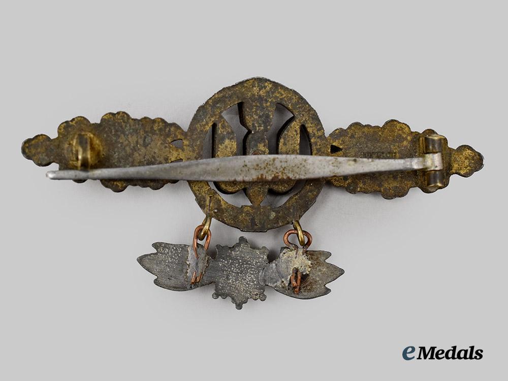 germany,_luftwaffe._a_bomber_clasp,_gold_grade_with_star_pendant,_by_g._h._osang___m_n_c0607
