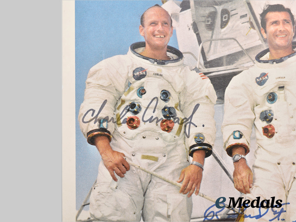 united_states._a_signed_photograph_of_all_three_members_of_the_n_a_s_a_apollo12_crew___m_n_c0630