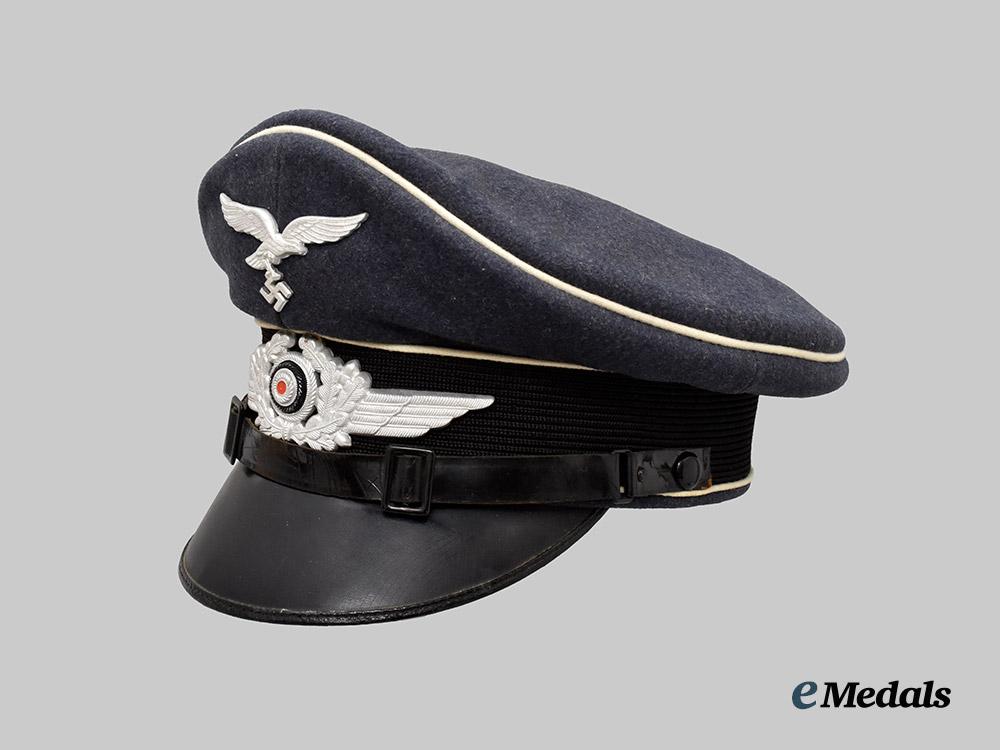 germany,_luftwaffe._a_rare1st_fallschirm-_panzer_division_hermann_göring_e_m/_n_c_o’s_visor_cap,_by_schellenberg___m_n_c0647