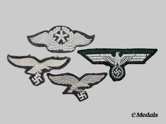 germany,_wehrmacht._a_mixed_lot_of_uniform_insignia___m_n_c0694
