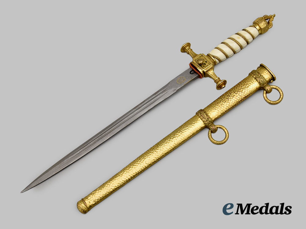 germany,_imperial._a_rare_navy_officer’s_dress_dagger,_with_damascus_blade_and_hanger,_by_carl_eickhorn___m_n_c0723