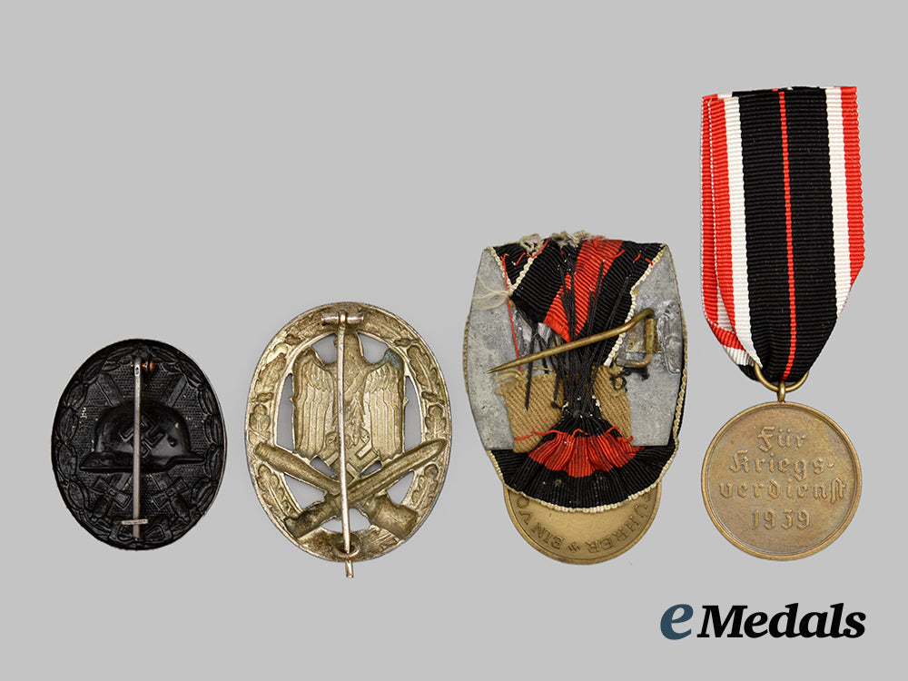 germany,_third_reich._a_group_of_four_medals,_awards,_and_decorations___m_n_c0793