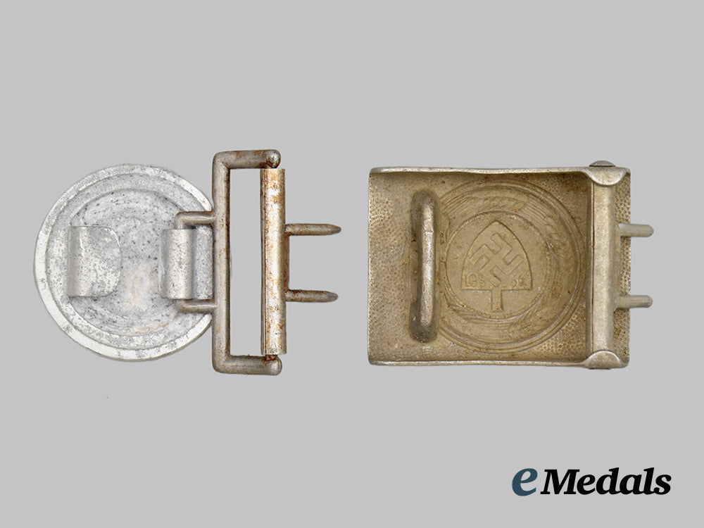 germany,_third_reich._a_group_of_two_reich_labour_service_belt_buckles___m_n_c0831
