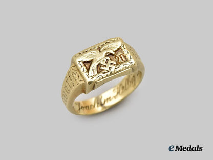germany,_luftwaffe._a14kt_gold_luftwaffe_ring_belonging_to_knight’s_cross_recipient_hauptmann_helbig_accompanied_by_a_signed_studio_photograph___m_n_c0848