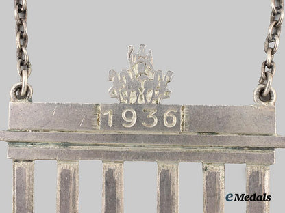 germany,_third_reich._a1936_berlin_olympics_commemorative_hanger_to_master_marksman_eugen_wutke___m_n_c0849