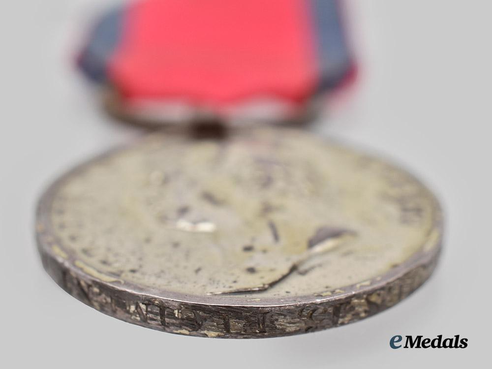 united_kingdom._a_waterloo_medal_to_private_william_holmes,15th_kings_hussars___m_n_c0950