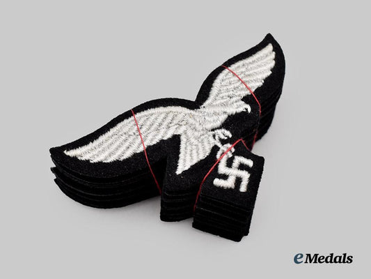 germany,_luftwaffe._a_lot_of_mint_and_unissued1st_fallschirm-_panzer_division_hermann_göring_uniform_eagles___m_n_c1023