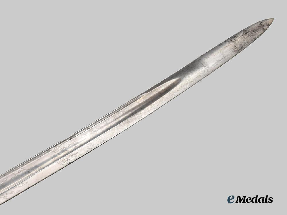 united_states._a_model1952_naval_officer’s_dress_sword___m_n_c1034