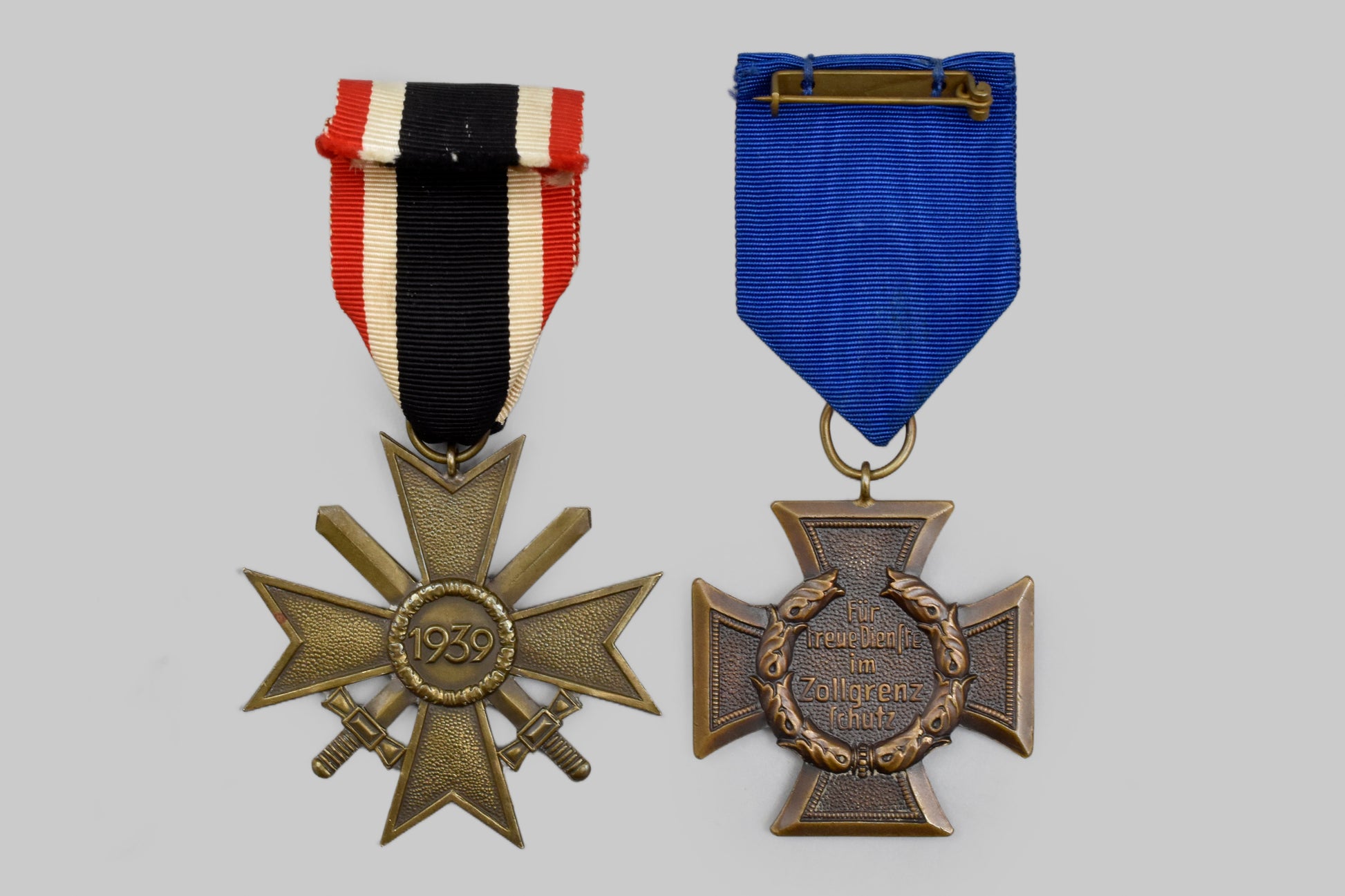 germany,_third_reich._a_pair_of_awards_for_customs_and_second_world_war_service,_with_matching_ribbon_bar___m_n_c1048