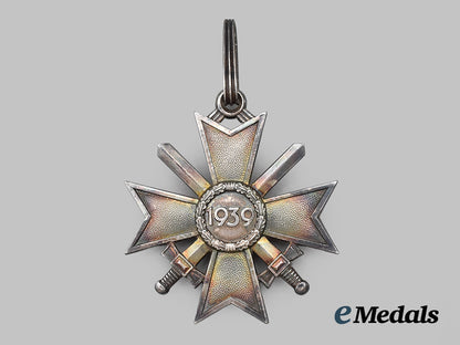 germany,_wehrmacht._a_rare_knight’s_cross_of_the_war_merit_cross_with_swords,_by_deschler&_sohn___m_n_c1102