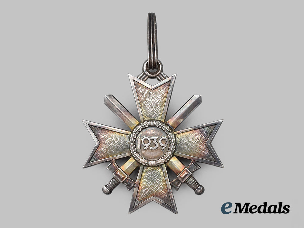 germany,_wehrmacht._a_rare_knight’s_cross_of_the_war_merit_cross_with_swords,_by_deschler&_sohn___m_n_c1102