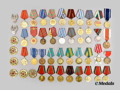 Bulgaria, Poland, Romania, Soviet Union, Yugoslavia. Lot of Forty Eastern European Socialist Medals and Eight Assorted Badges