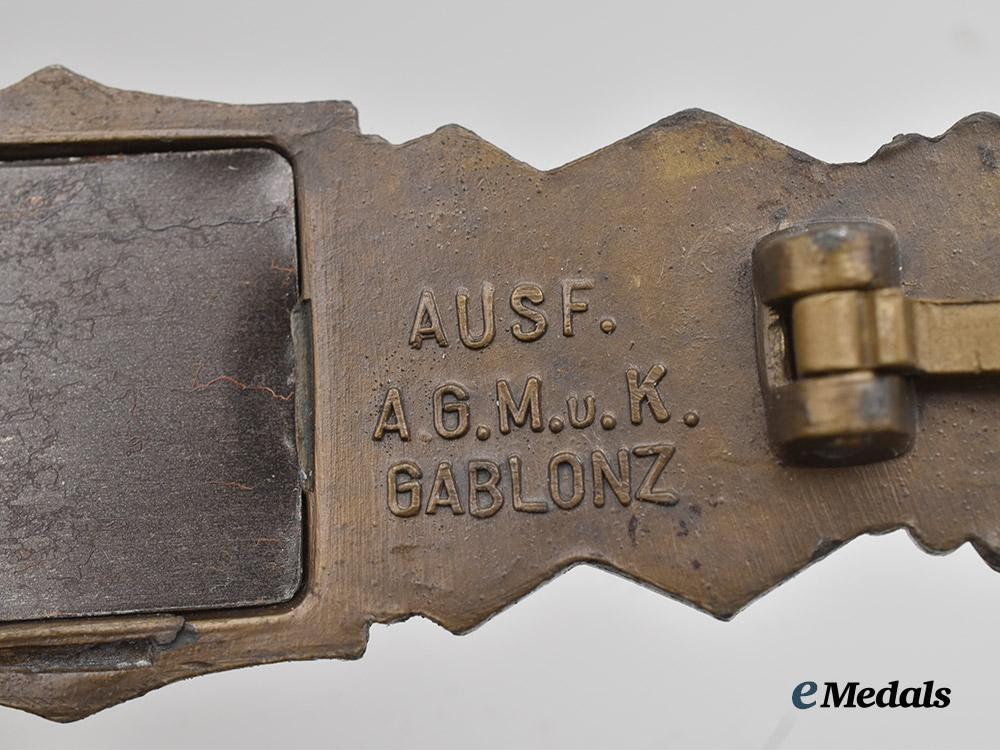 germany,_wehrmacht._a_close_combat_clasp,_first_pattern_large_font_variant,_by_a._g._m.u._k___m_n_c1436