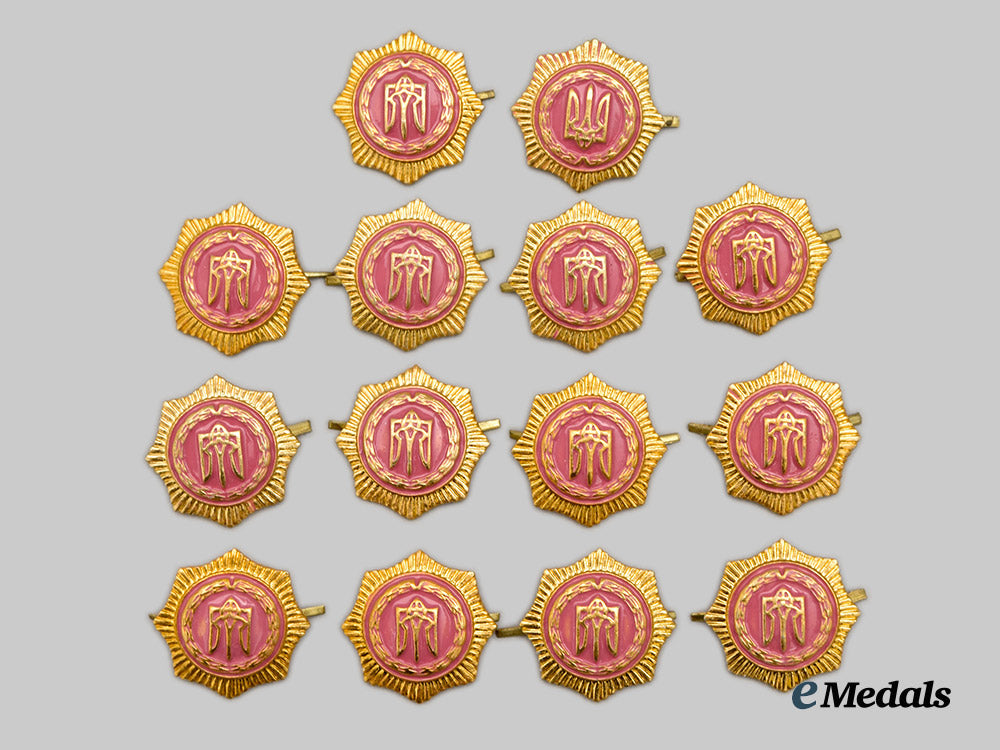 ukraine,_republic._a_group_of_fourteen_mint_and_unissued_auxiliary_police_cap_badges,_c.2000___m_n_c1481