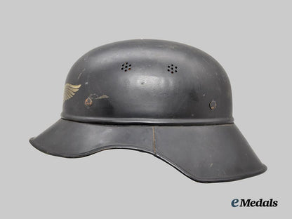 germany,_third_reich._a_luftschutz_gladiator_helmet,_mid-_war_three-_piece_version___m_n_c1645