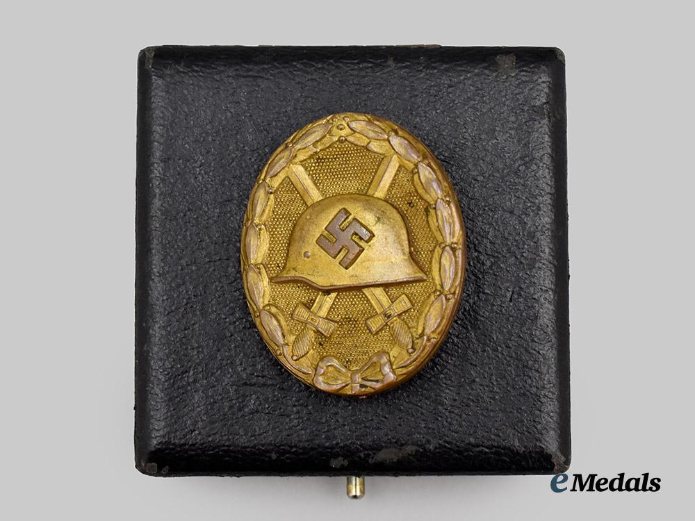 germany,_wehrmacht._a_gold_grade_wound_badge,_with_case,_by_the_vienna_mint___m_n_c1650