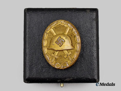 germany,_wehrmacht._a_gold_grade_wound_badge,_with_case,_by_the_vienna_mint___m_n_c1650