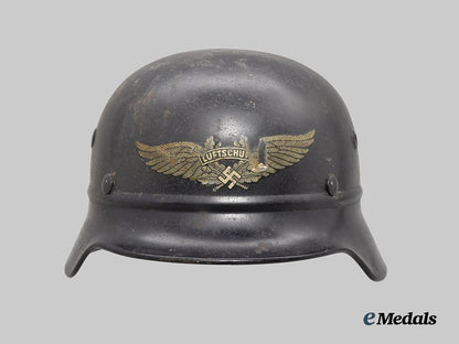 germany,_third_reich._a_luftschutz_m35_beaded_stahlhelm,_by_f._w._quist___m_n_c1667