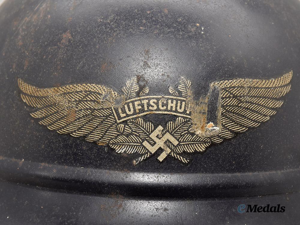 germany,_third_reich._a_luftschutz_m35_beaded_stahlhelm,_by_f._w._quist___m_n_c1672