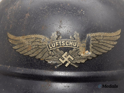 germany,_third_reich._a_luftschutz_m35_beaded_stahlhelm,_by_f._w._quist___m_n_c1672