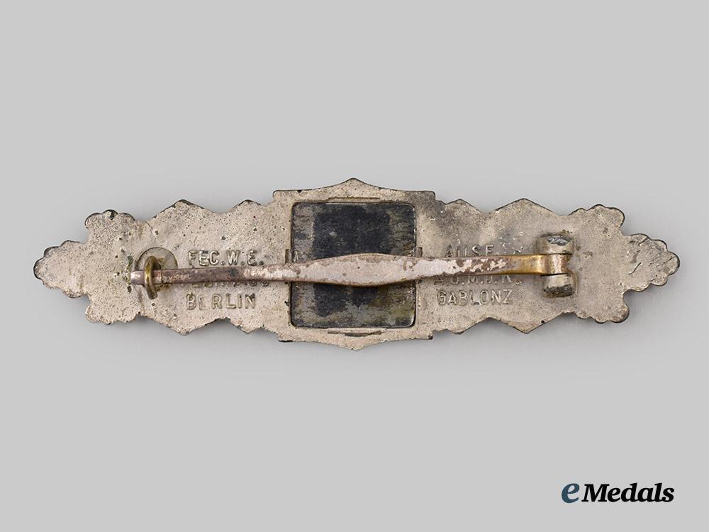 germany,_wehrmacht._a_close_combat_clasp,_silver_grade,_first_pattern_by_a._g._m.u._k.___m_n_c1695