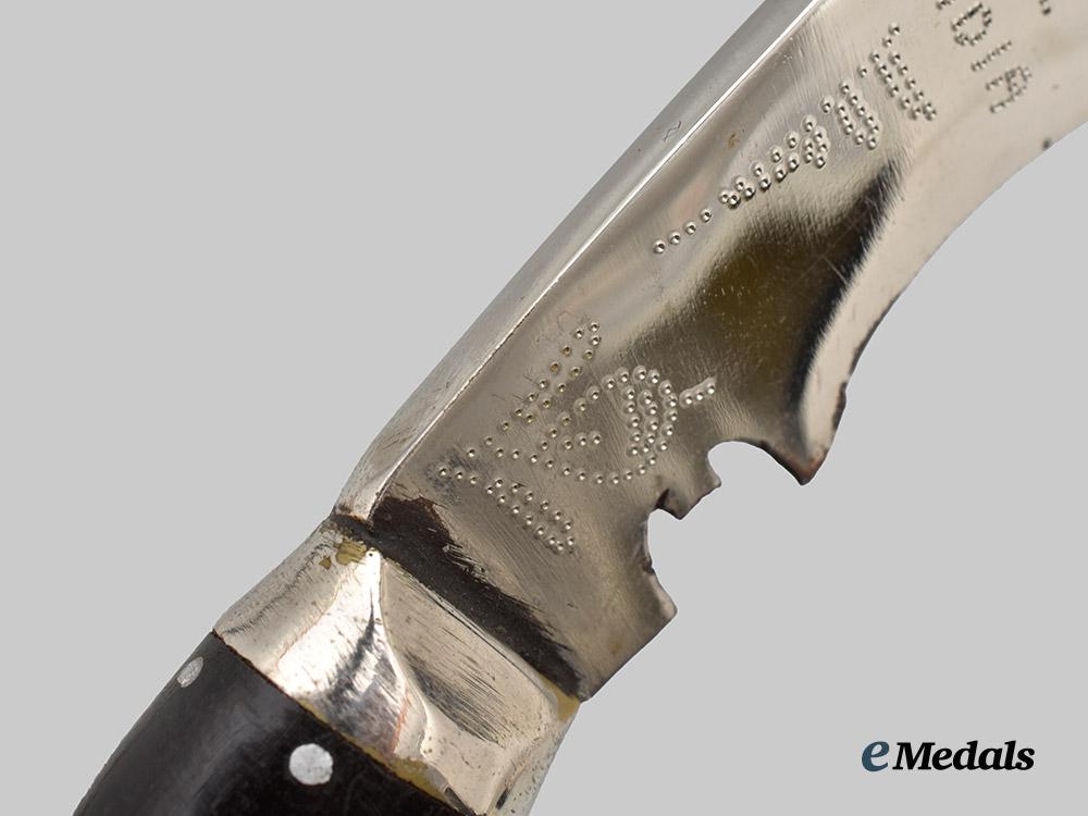 united_kingdom._a_post_war_british_india_gurkha_kukri_with_scabbard___m_n_c1744